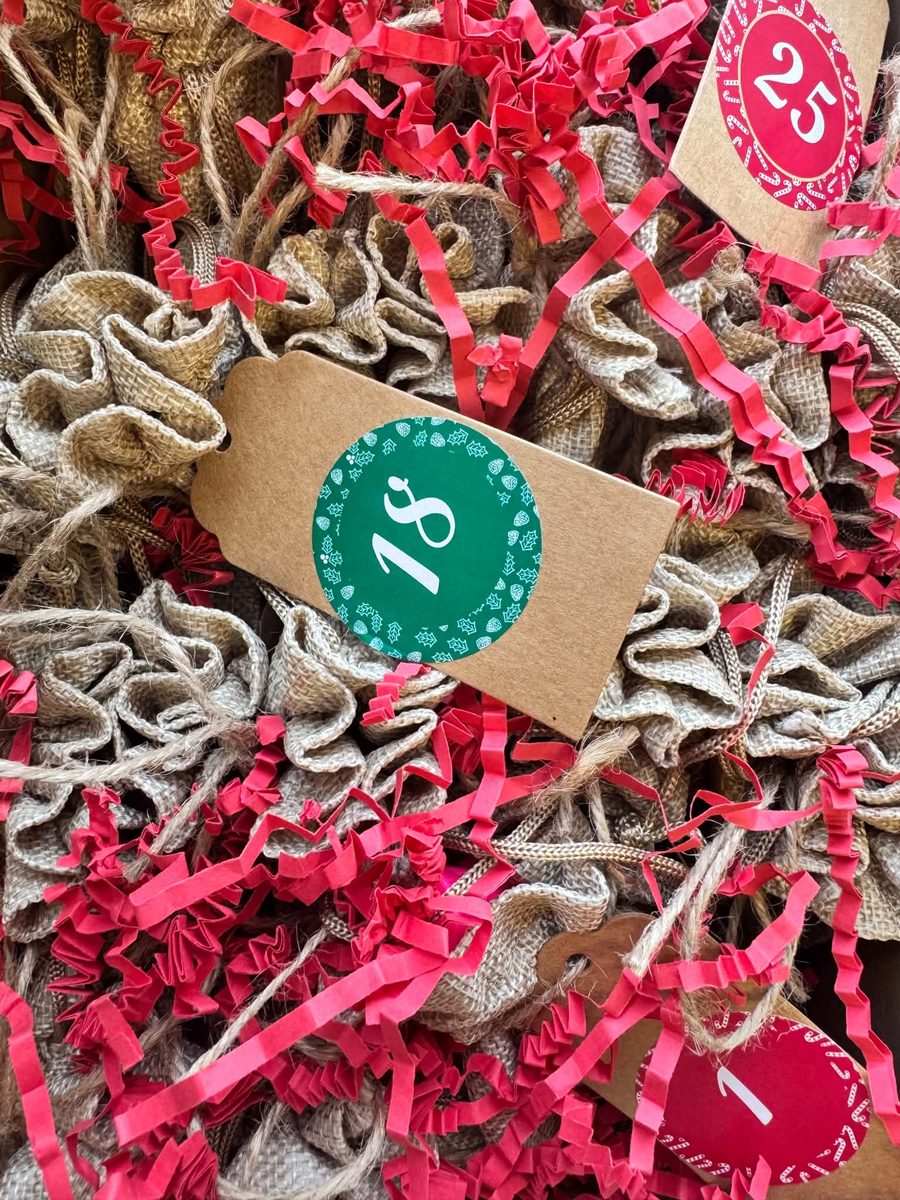 Reusable hessian bag advent calendar with numbered gift tags